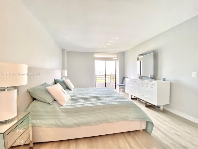 bedroom with light wood-type flooring