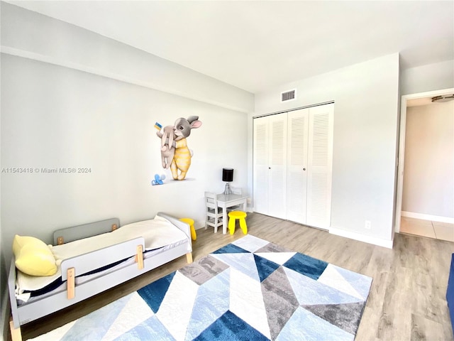 interior space with a closet and light wood-type flooring