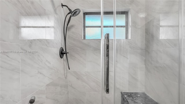 bathroom with an enclosed shower