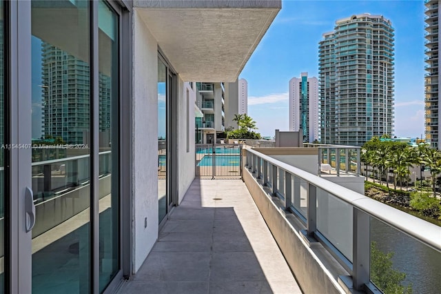 balcony with a community pool