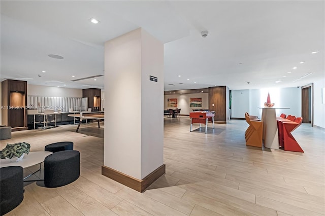 interior space featuring billiards and light hardwood / wood-style flooring