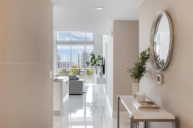 hallway with light tile floors