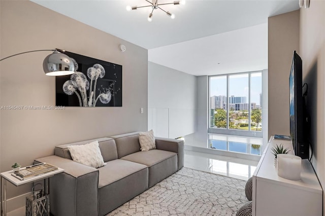 living room with an inviting chandelier