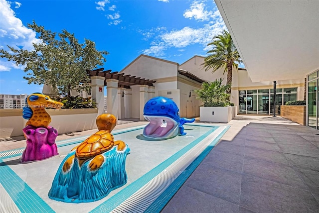 view of pool featuring a pergola and a patio