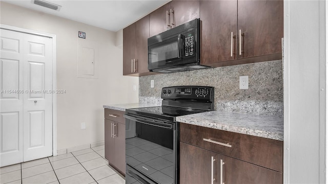 kitchen with black appliances, tasteful backsplash, dark brown cabinets, and light tile patterned floors