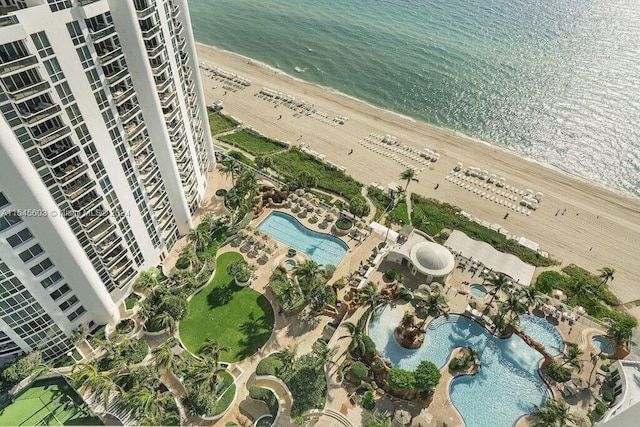 drone / aerial view with a view of the beach and a water view