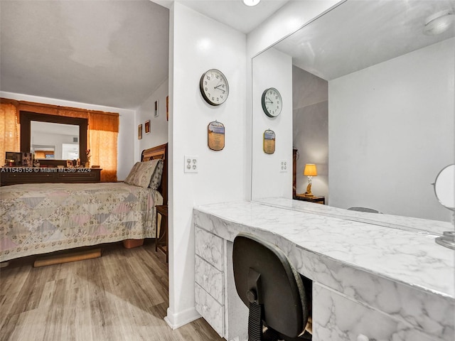 bedroom featuring light hardwood / wood-style floors