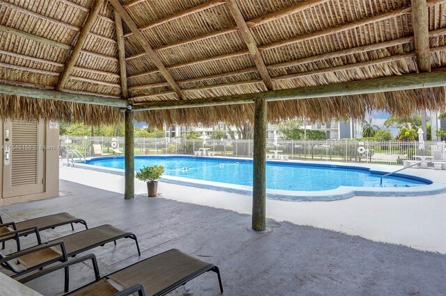 view of swimming pool featuring a gazebo and a patio area