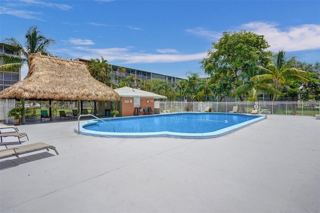 view of swimming pool with a patio