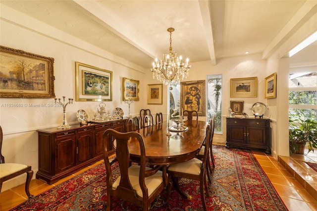 tiled dining area with an inviting chandelier and beamed ceiling