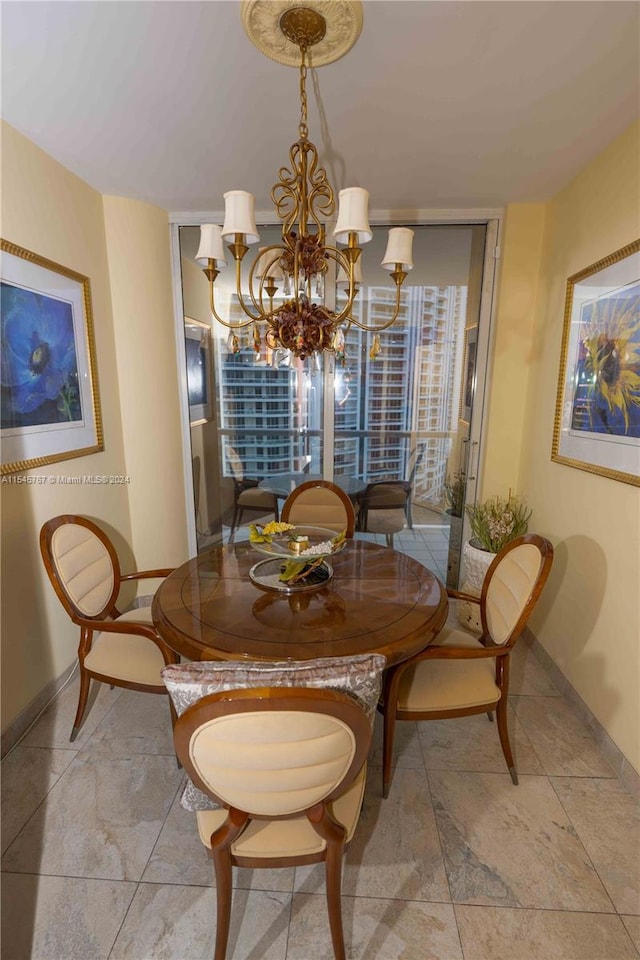 dining space with a notable chandelier