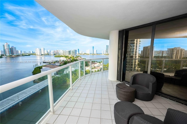 balcony featuring a water view