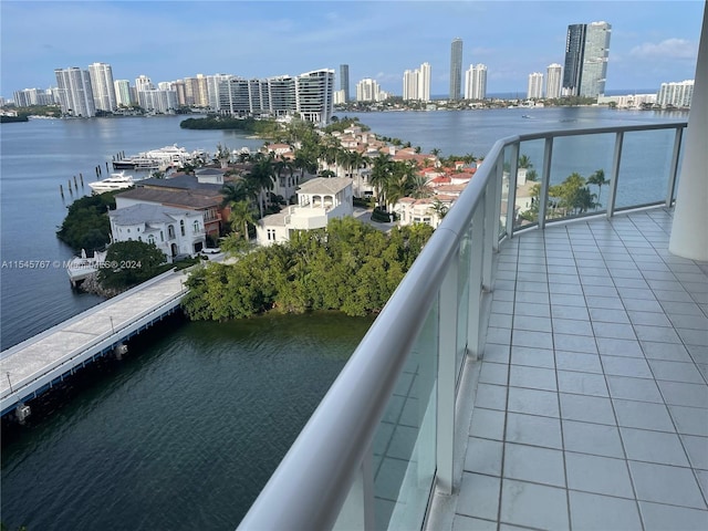 balcony featuring a water view