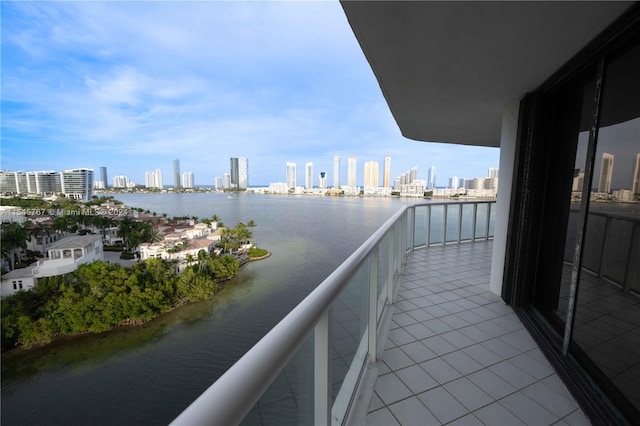 balcony featuring a water view