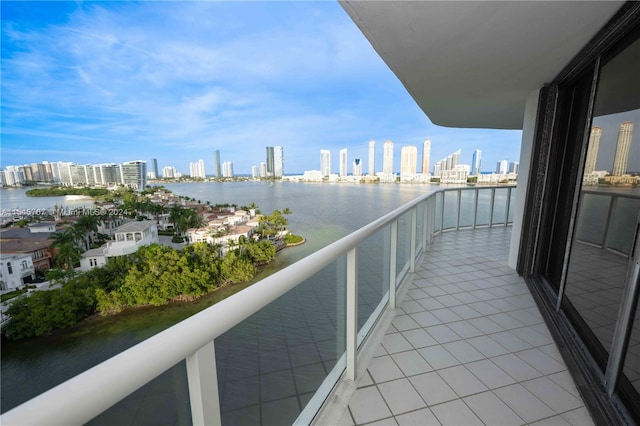 balcony featuring a water view