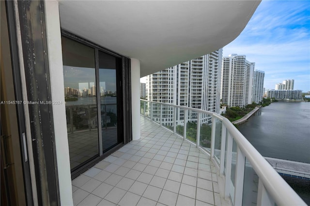 balcony featuring a water view