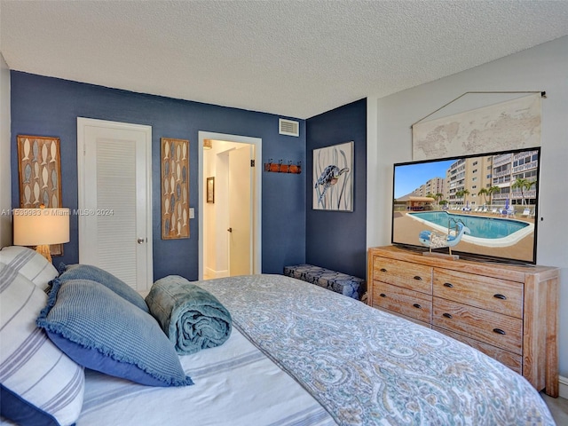 bedroom with a textured ceiling