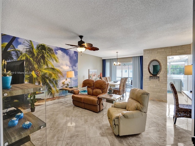 living room featuring light tile floors, a textured ceiling, and ceiling fan with notable chandelier