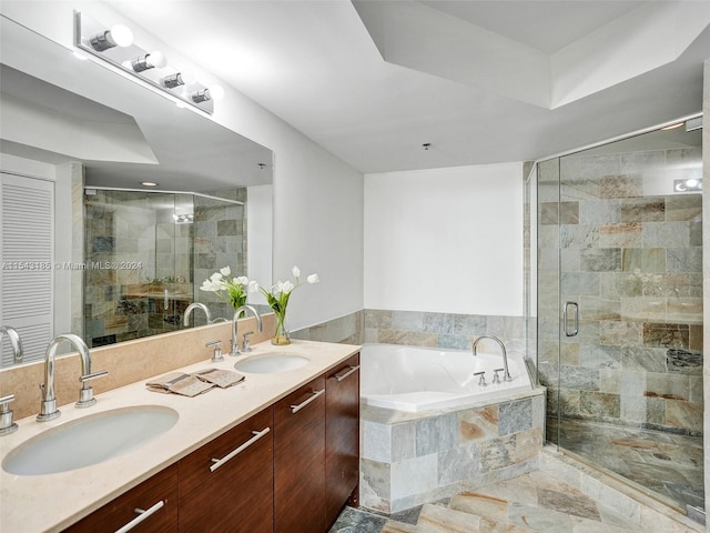 bathroom featuring shower with separate bathtub, tile floors, and dual bowl vanity