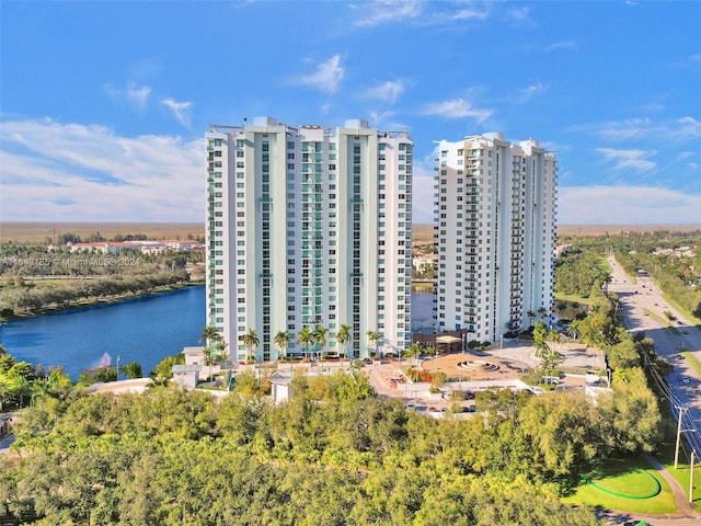 view of building exterior with a water view