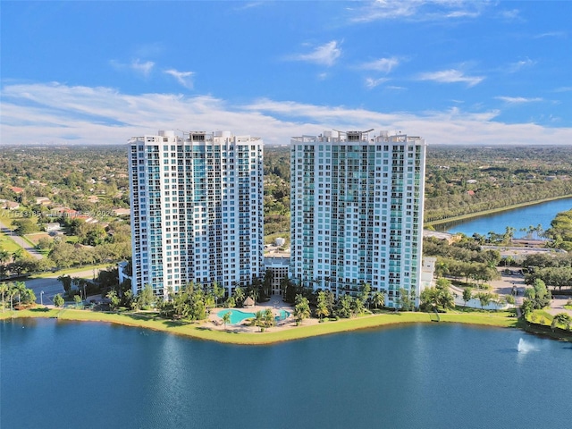 birds eye view of property with a water view