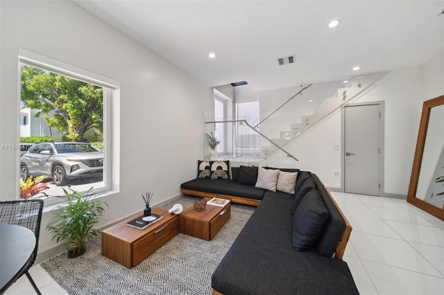 living room featuring light tile patterned flooring