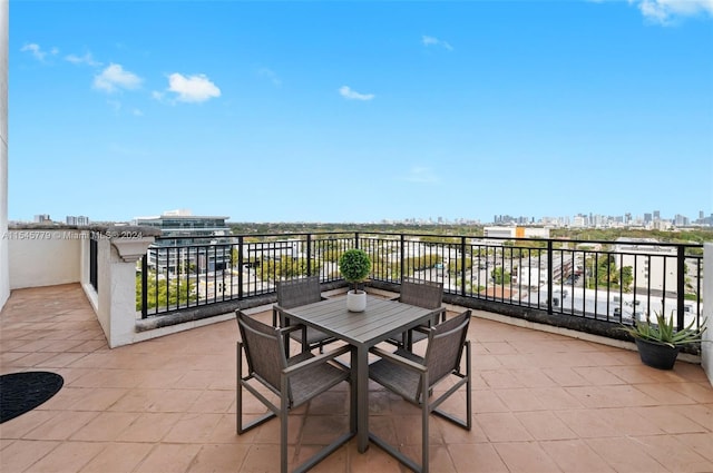 view of patio with a balcony