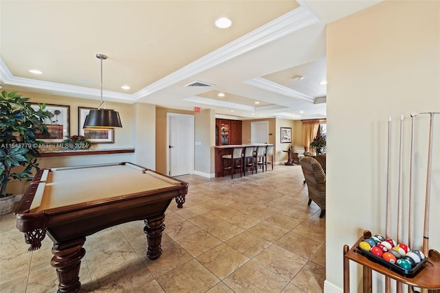 recreation room featuring ornamental molding, pool table, light tile floors, and a raised ceiling