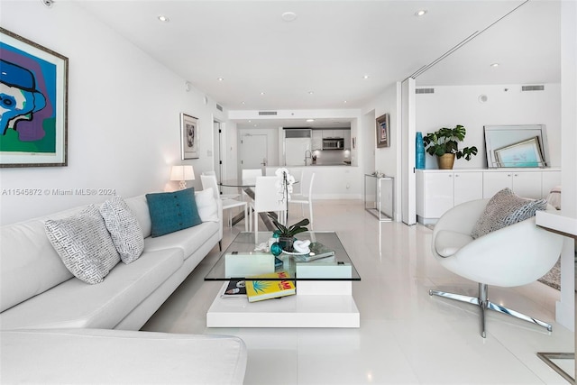 tiled living room with sink