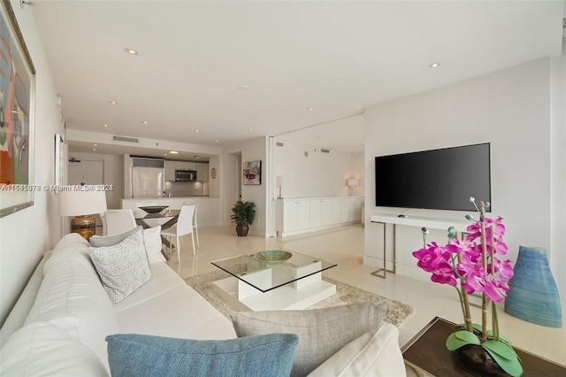 living room with light tile flooring