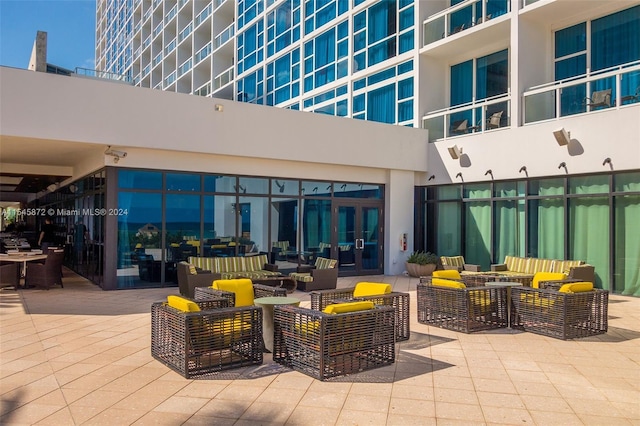 view of patio / terrace with an outdoor hangout area and a balcony