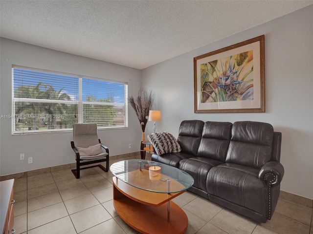 tiled living room with a textured ceiling