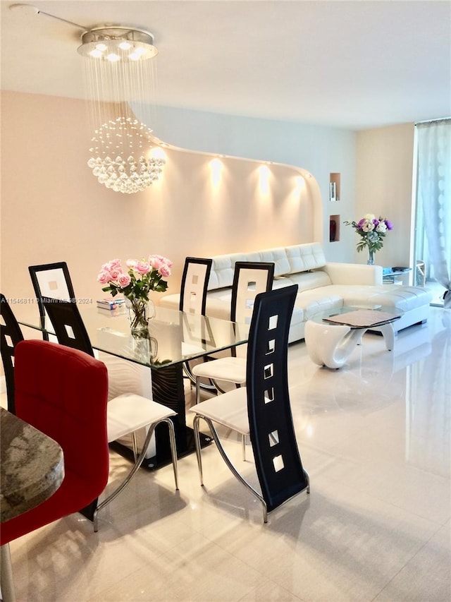 dining room featuring a chandelier