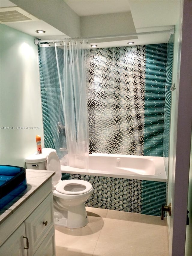 full bathroom featuring vanity, shower / bath combination with curtain, tile flooring, and toilet