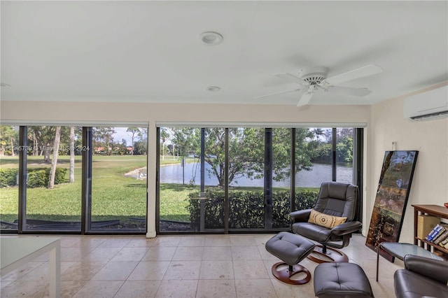 sunroom / solarium with a wall mounted air conditioner, a water view, and ceiling fan