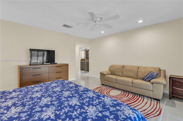 bedroom featuring ceiling fan and light tile floors