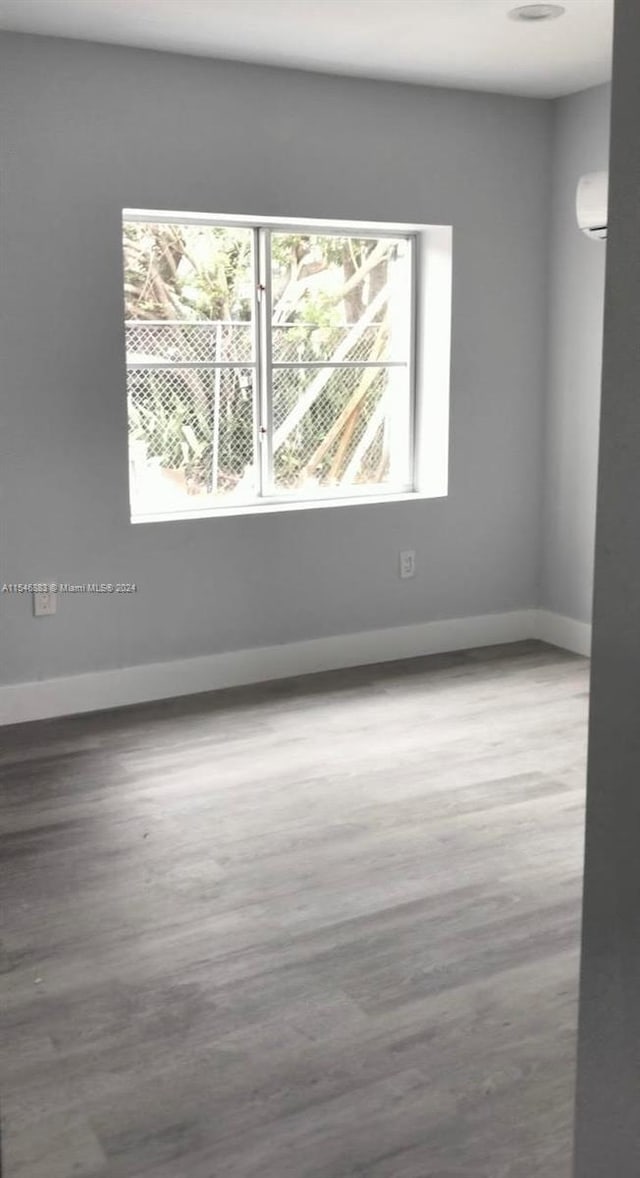 spare room featuring light hardwood / wood-style floors