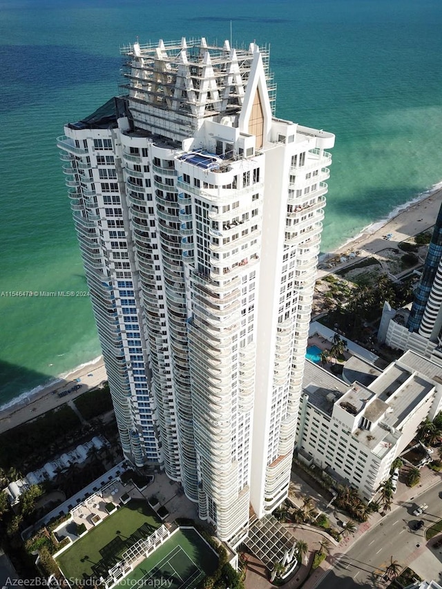 birds eye view of property featuring a water view