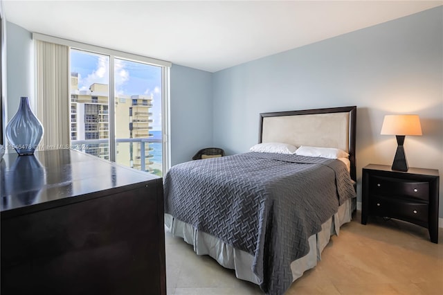 bedroom with multiple windows