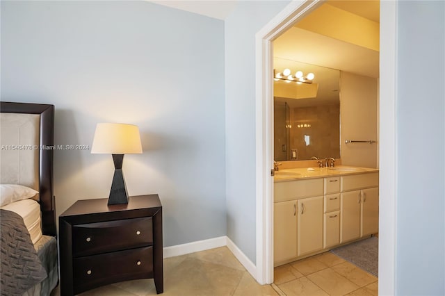 bathroom featuring tile floors and double vanity