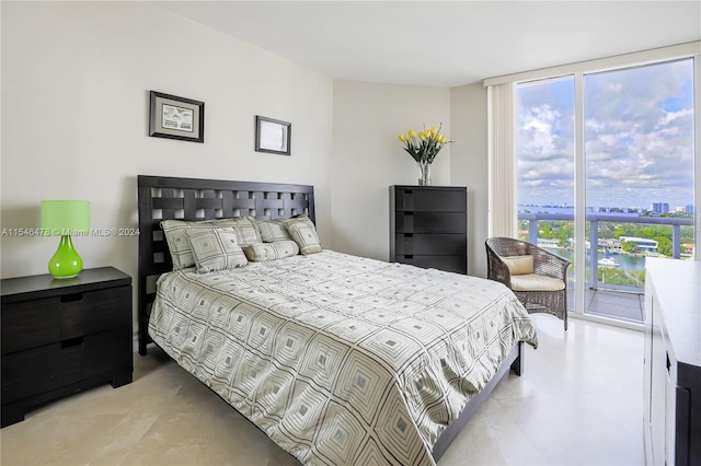 bedroom featuring access to outside and multiple windows