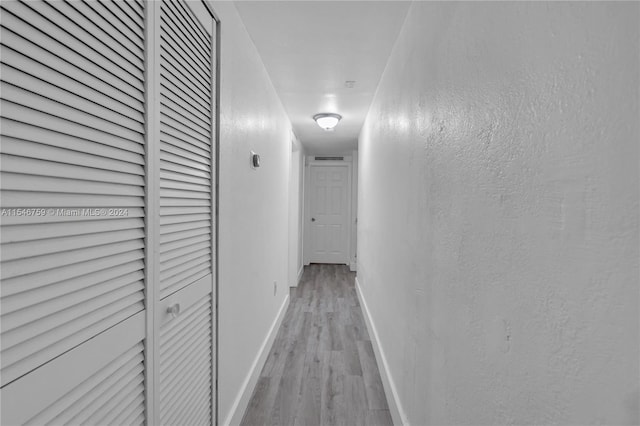 hall featuring light wood-type flooring