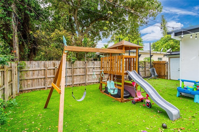 view of play area featuring a yard