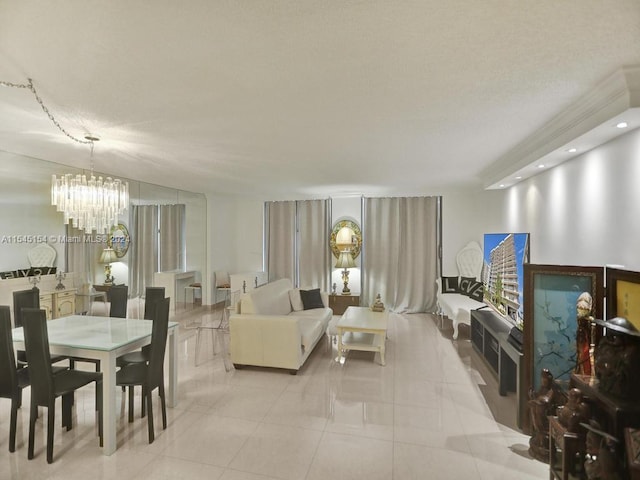 living room featuring light tile flooring and a notable chandelier