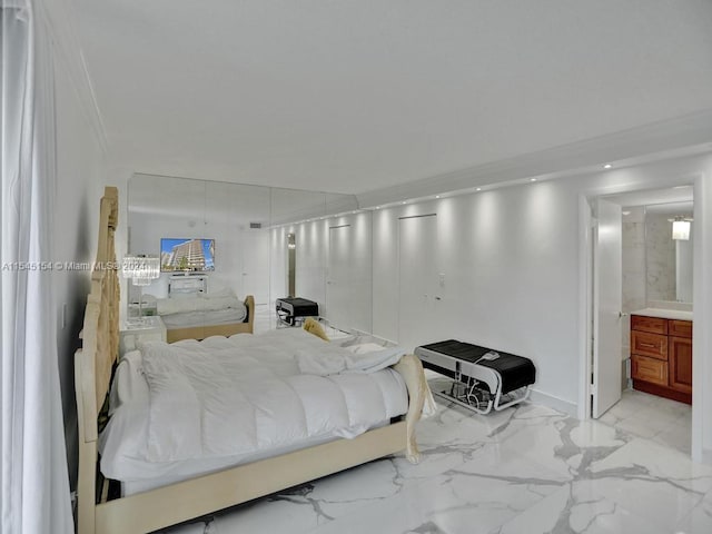 bedroom with light tile flooring and ensuite bath