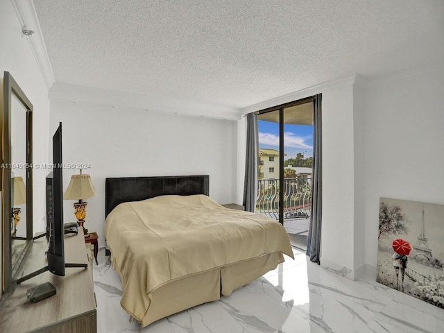 bedroom featuring a textured ceiling, access to exterior, expansive windows, and light tile floors