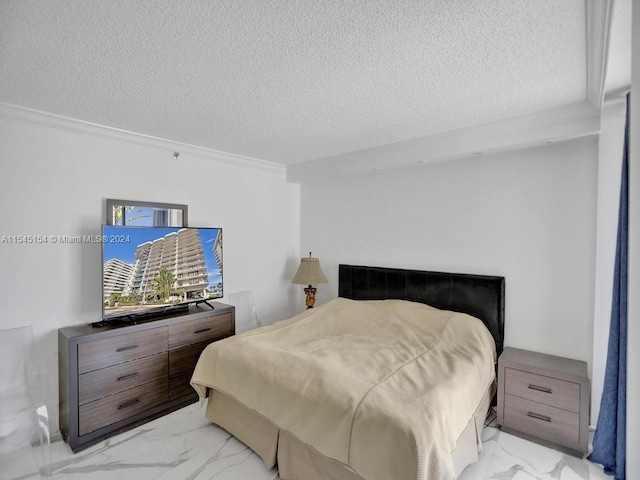 bedroom featuring a textured ceiling