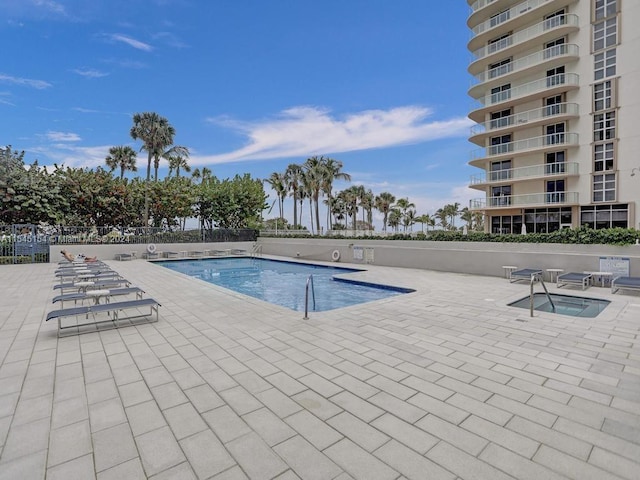 view of pool featuring a patio area