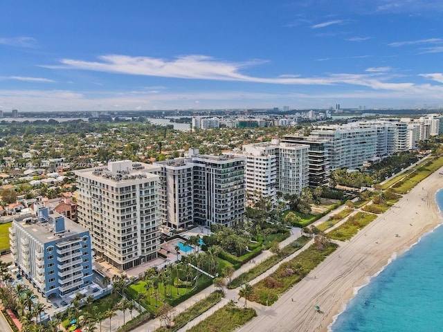 aerial view featuring a water view and a beach view