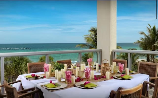 balcony featuring a water view